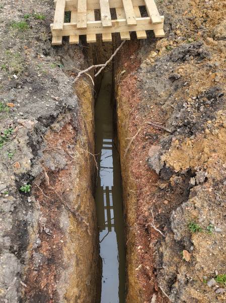 Tranchée électrique construction piscine enterrée à Montceau les Mines en Saône et Loire proche de Lyon