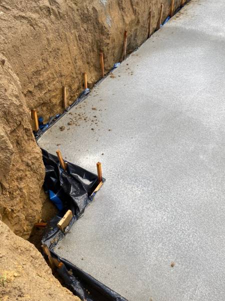 bien réaliser une dalle de piscine à Savigneux dans l'Ain